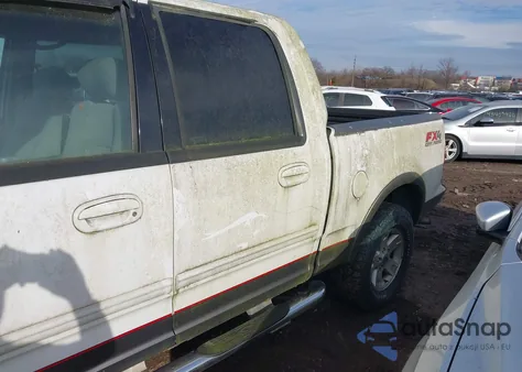 2002 Ford F-150 Lariat/Xlt z USA, uszkodzony, nr VIN 1FTRW08LX2KE34597